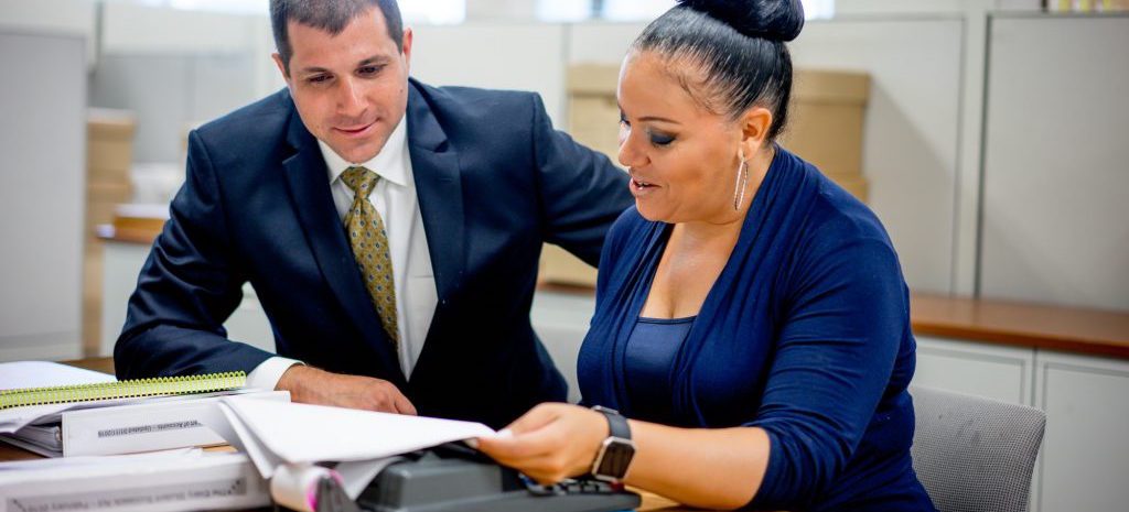 Coworkers reviewing information