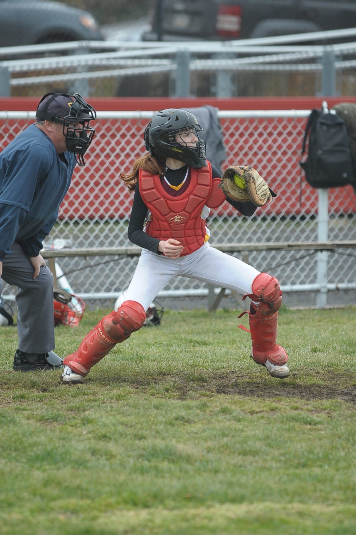 Catcher throwing the ball to an infielder