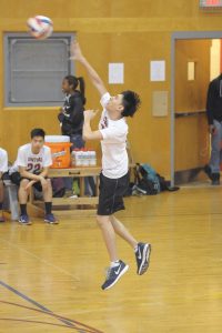 Player jumping during a serve