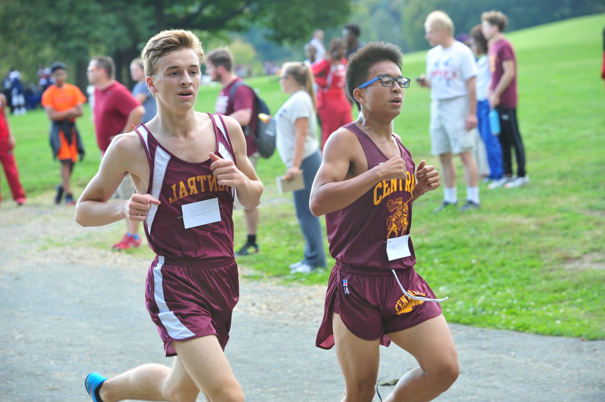 Two Central teammates running cross country
