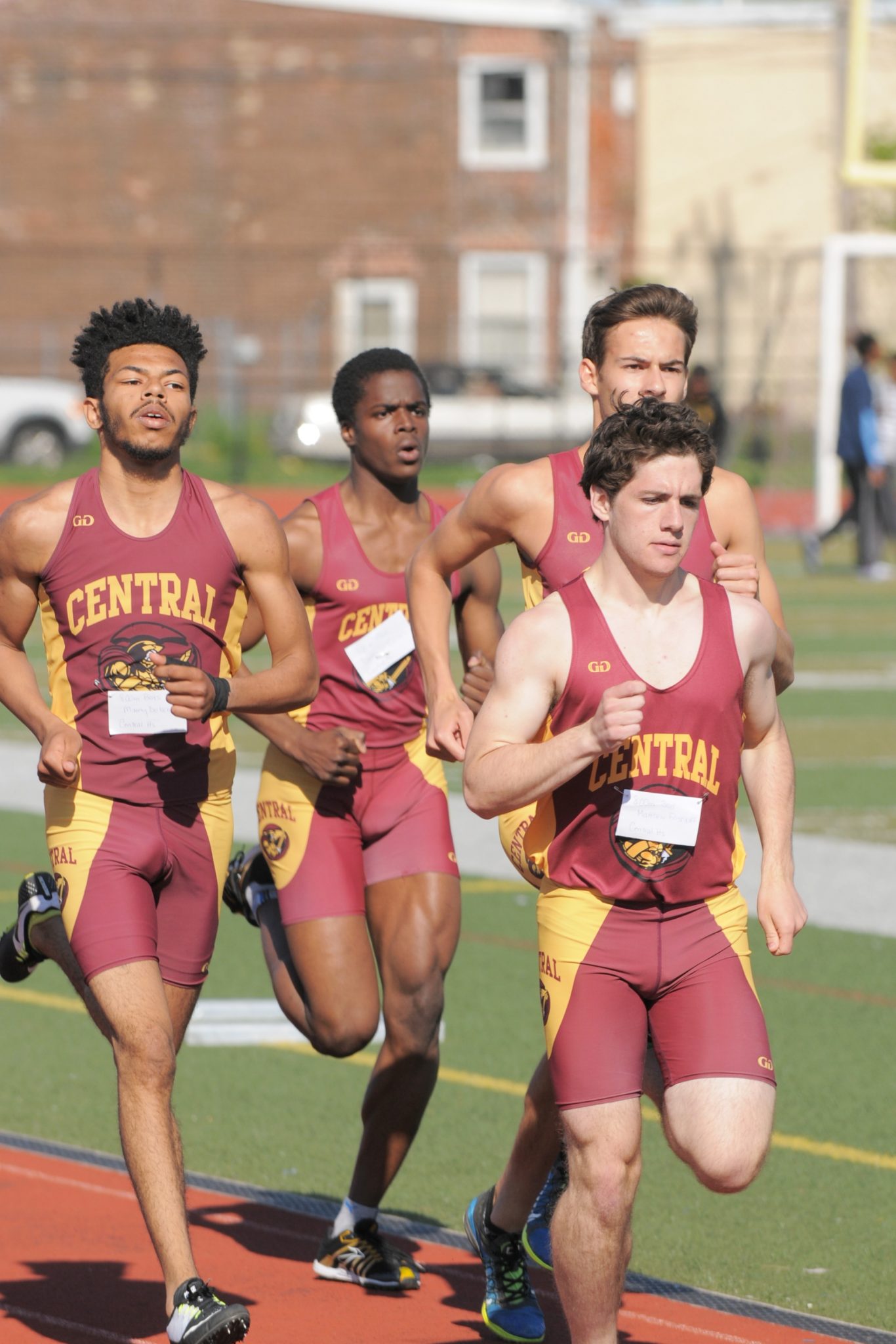 Members of boys' track running together