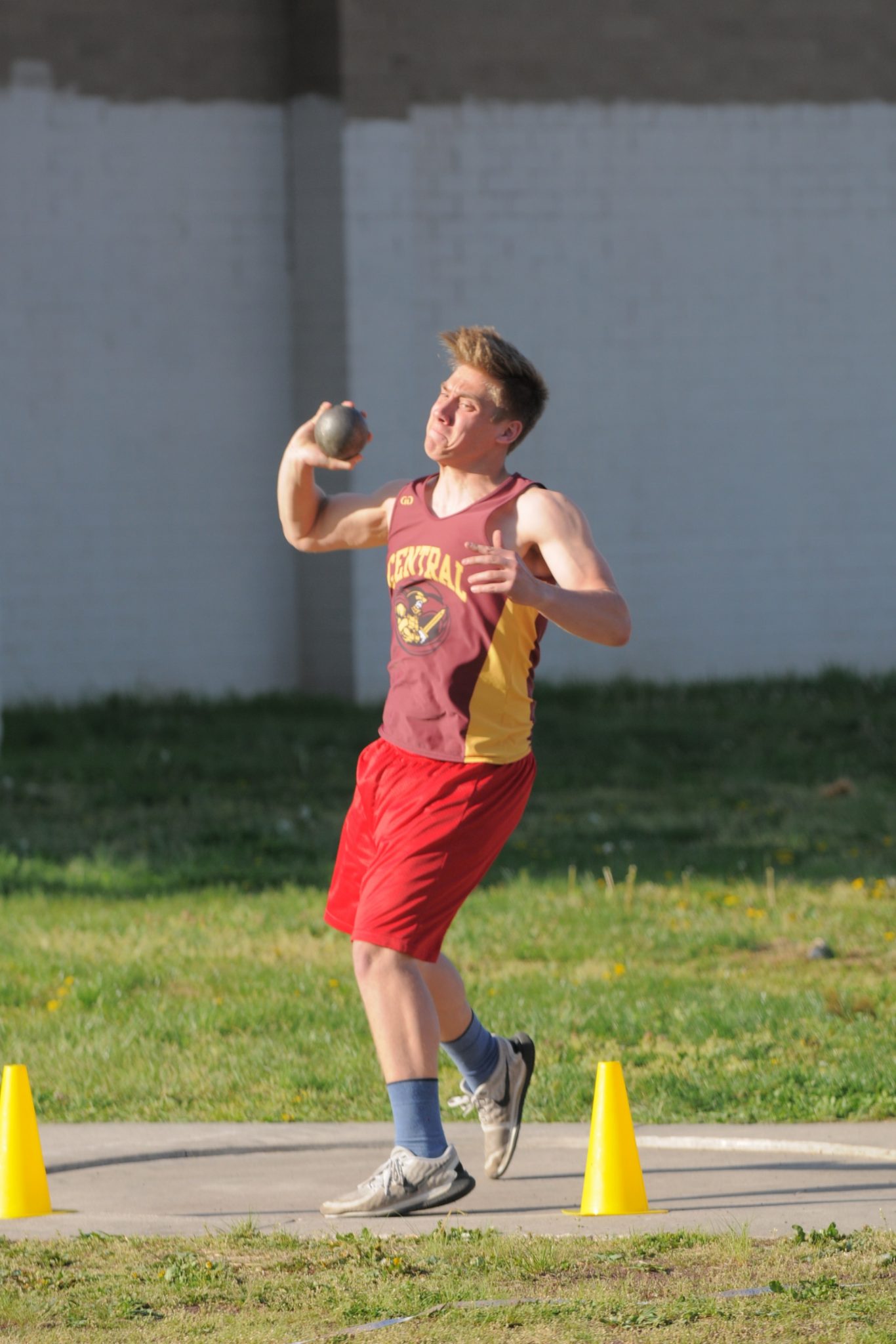 Boy doing Shotput