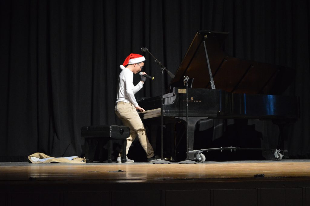 CHS Student singing and playing piano