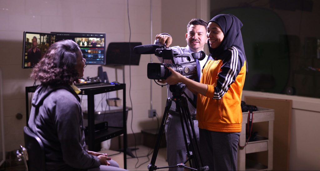 Student working with camera
