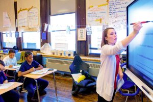 Teacher at board