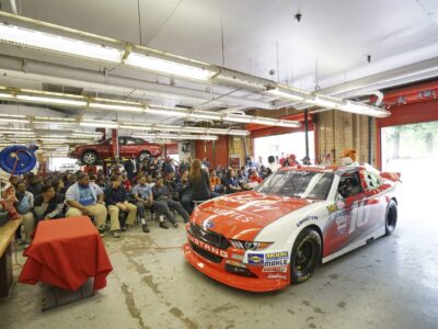 NASCAR Xfinity Cup drivers Bubba Wallace, Brennan Poole and Ryan Reed visit the School District of Philadelphia’s A. Phillip Randolph Technical High School, Tuesday May 17, 2016, in Philadelphia.  (Comcast Photo/ Joseph Kaczmarek)