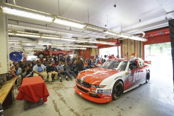NASCAR Xfinity Cup drivers Bubba Wallace, Brennan Poole and Ryan Reed visit the School District of Philadelphia’s A. Phillip Randolph Technical High School, Tuesday May 17, 2016, in Philadelphia.  (Comcast Photo/ Joseph Kaczmarek)