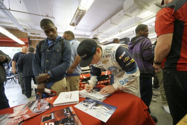 NASCAR Xfinity Cup drivers Bubba Wallace, Brennan Poole and Ryan Reed visit the School District of Philadelphia’s A. Phillip Randolph Technical High School, Tuesday May 17, 2016, in Philadelphia.  (Comcast Photo/ Joseph Kaczmarek)