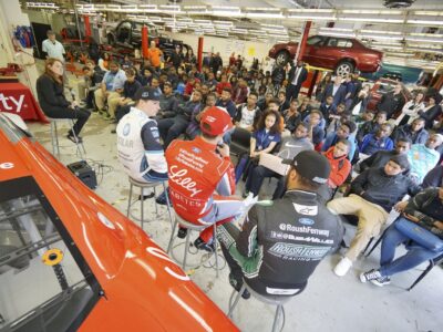 NASCAR Xfinity Cup drivers Bubba Wallace, Brennan Poole and Ryan Reed visit the School District of Philadelphia’s A. Phillip Randolph Technical High School, Tuesday May 17, 2016, in Philadelphia.  (Comcast Photo/ Joseph Kaczmarek)