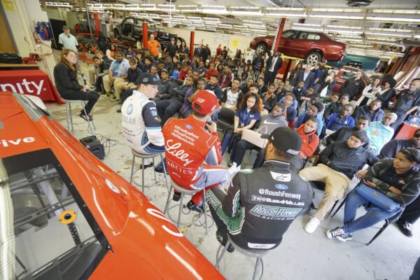 NASCAR Xfinity Cup drivers Bubba Wallace, Brennan Poole and Ryan Reed visit the School District of Philadelphia’s A. Phillip Randolph Technical High School, Tuesday May 17, 2016, in Philadelphia.  (Comcast Photo/ Joseph Kaczmarek)