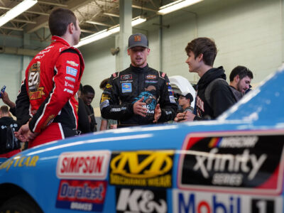 NASCAR Xfinity Series drivers Joey Gase, Brandon Brown, Kaz Grala, and Chad Finchum visit students enrolled in the automotive technology program at Swenson Arts and Technology High School in Northeast Philadelphia, Tuesday May 15, 2018, as part of the day long NASCAR Xfinity Series Philadelphia Takeover. Comcast Photo/ Joseph Kaczmarek