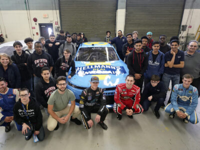 NASCAR Xfinity Series drivers Joey Gase, Brandon Brown, Kaz Grala, and Chad Finchum visit students enrolled in the automotive technology program at Swenson Arts and Technology High School in Northeast Philadelphia, Tuesday May 15, 2018, as part of the day long NASCAR Xfinity Series Philadelphia Takeover. Comcast Photo/ Joseph Kaczmarek