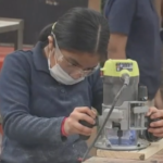 Mayfair middle schooler working a router