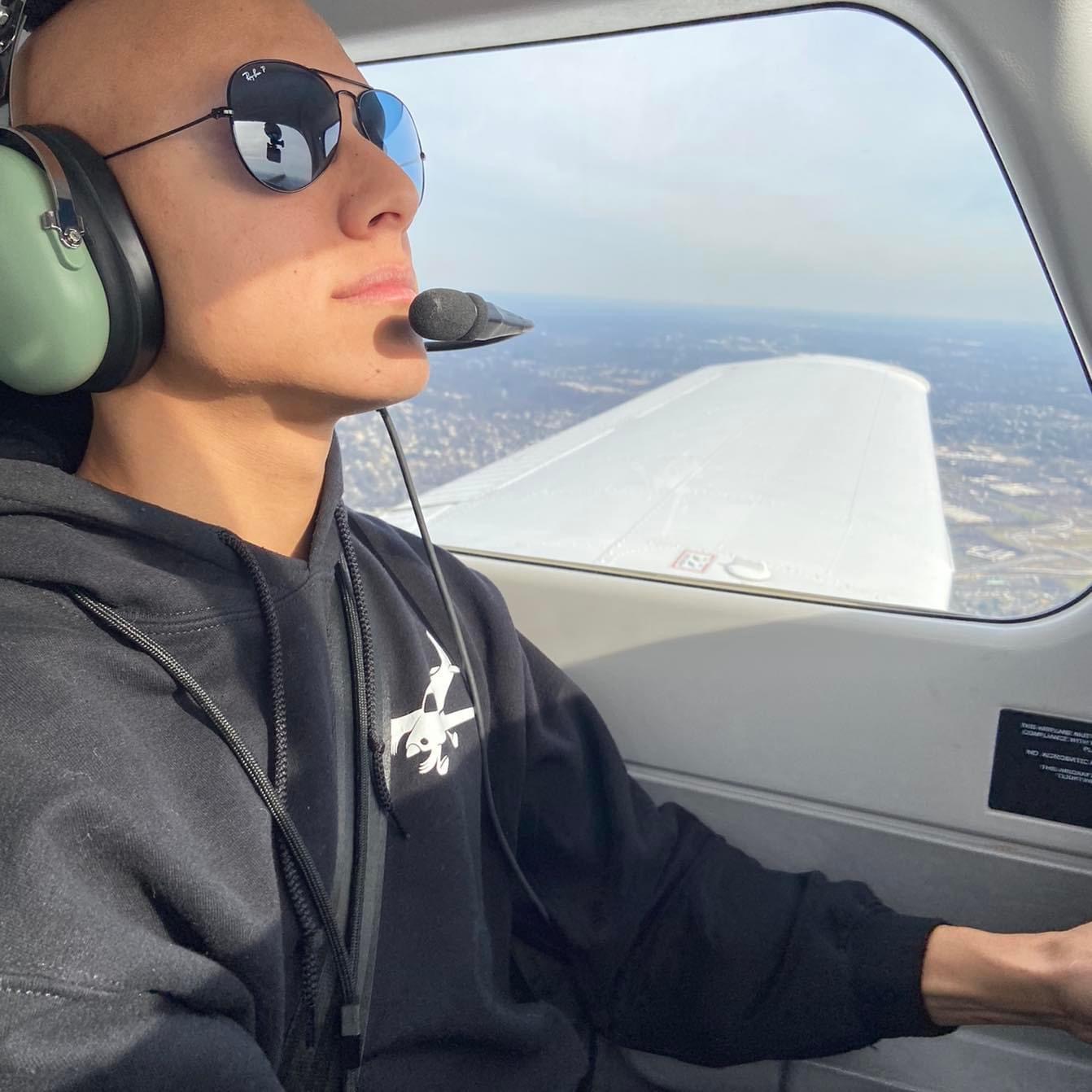 Angel DeJesus flying a plane