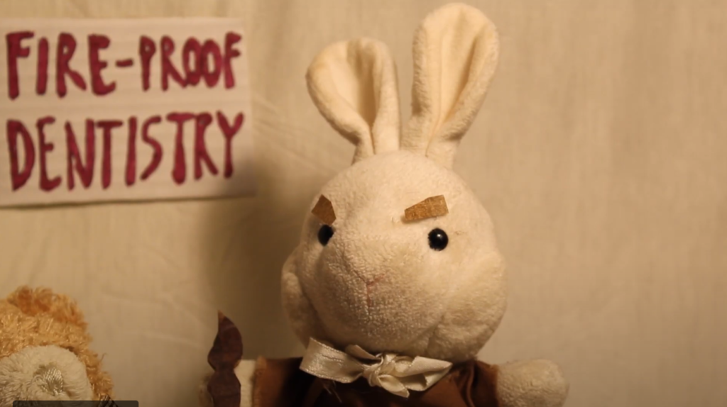 a plush bunny playing as a character in the film Puppets n' Murder