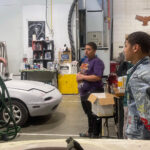 CTE auto collision students listening to guest speaker