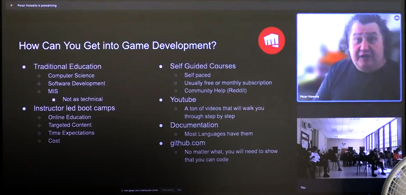 Peter Howells giving a presentation on how to get into game development
