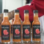 A row of 5 Habanero Hall Sweet Sauce