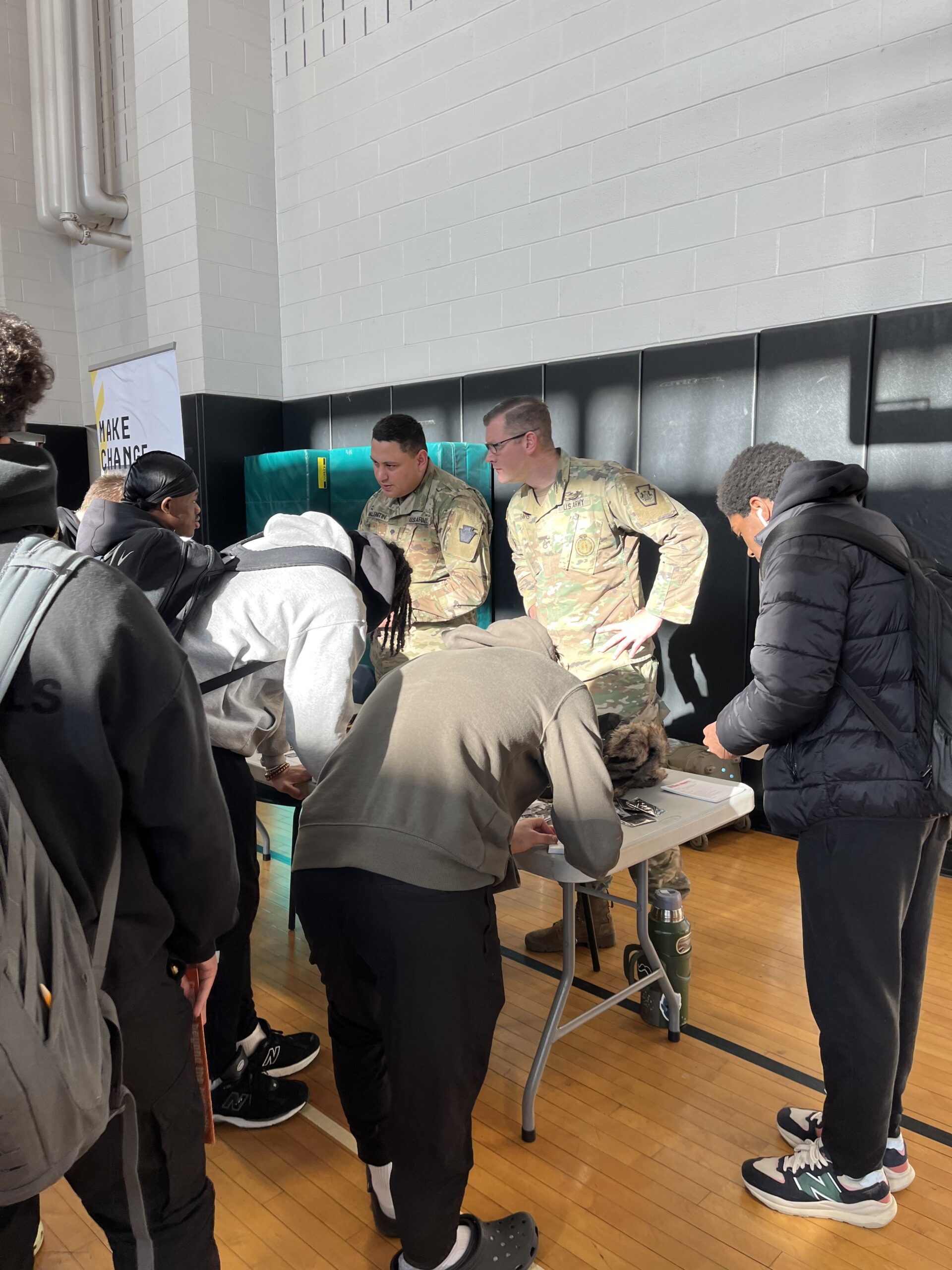 students at Lincoln HS speaking to a military recruiters during the Trade & Union Fair @ Lincoln HS