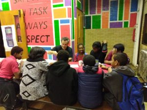 Students with teacher at Literacy Night