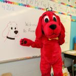 Clifford with portrait of himself at Decatur