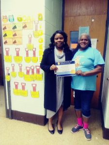 Prince Hall School Principal Donna Ragsdale with volunteer Ms. Tommie.