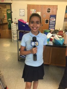 Broadcast club student with microphone