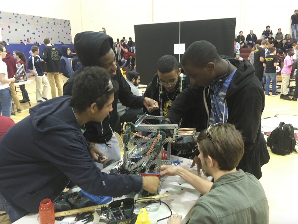 Boys Working at Vex Competition