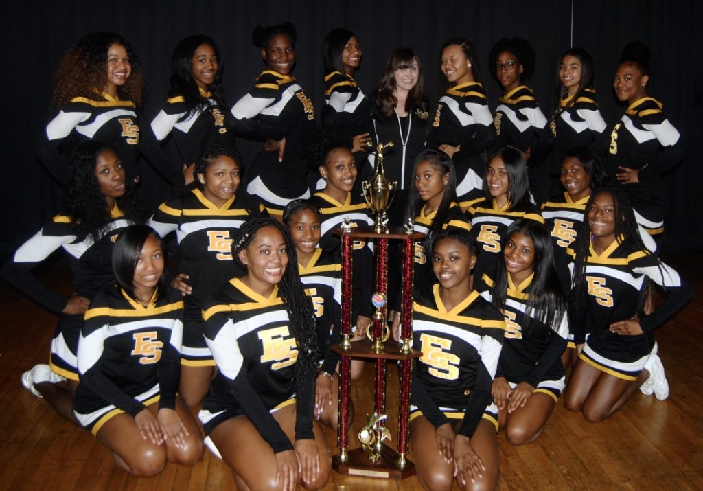Cheerleader team with trophy