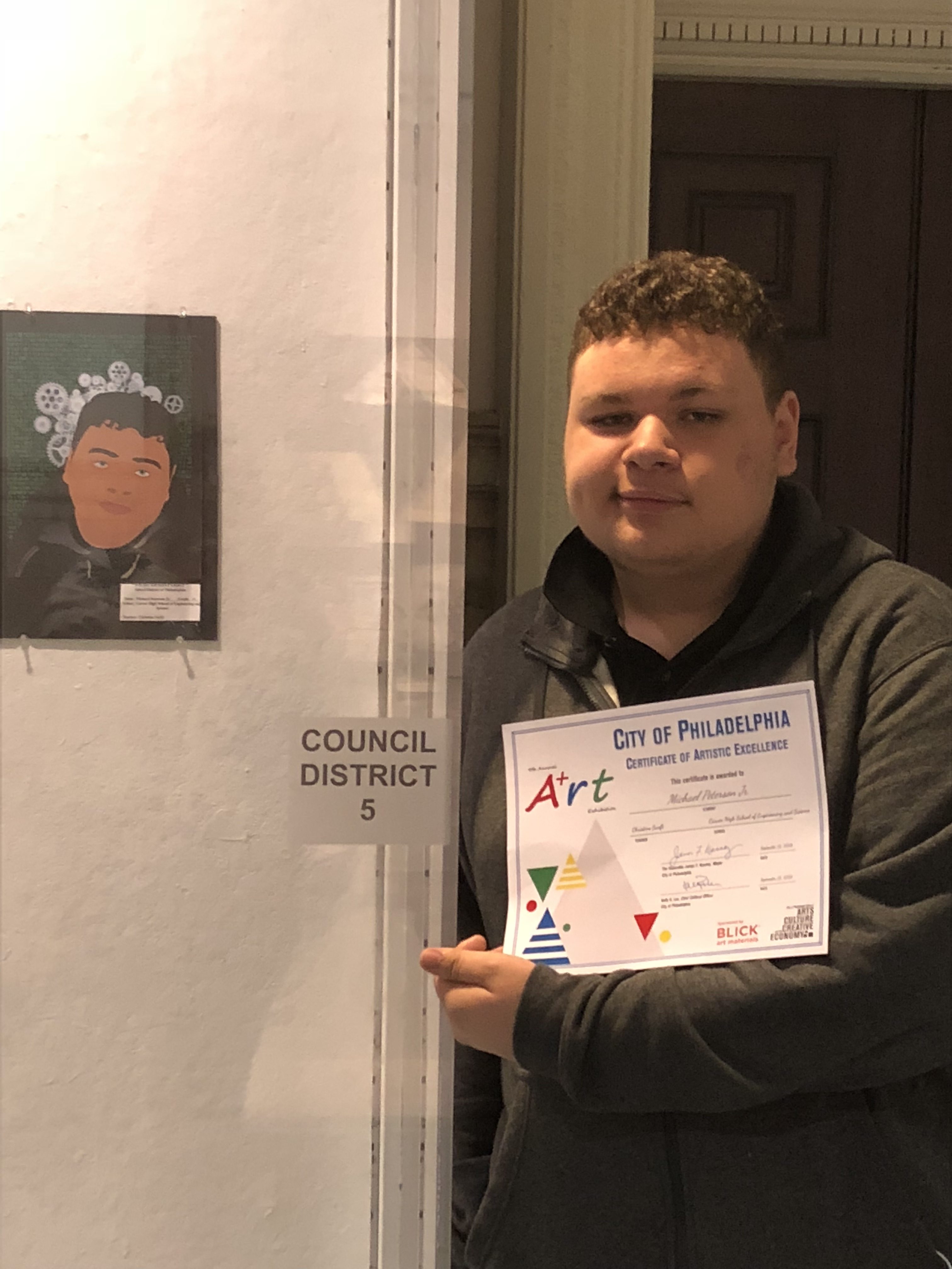 student with artwork