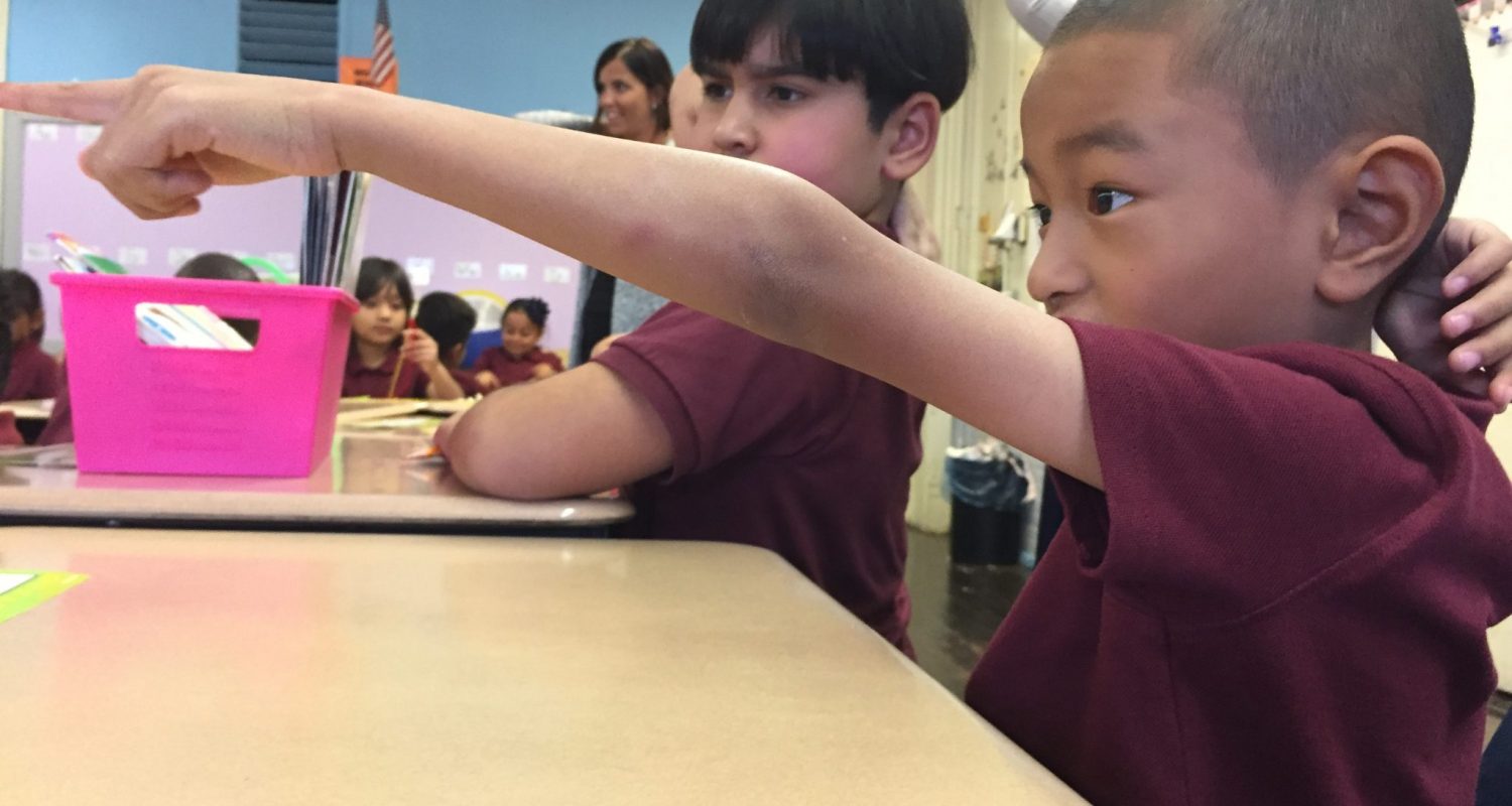 Kailand Student pointing