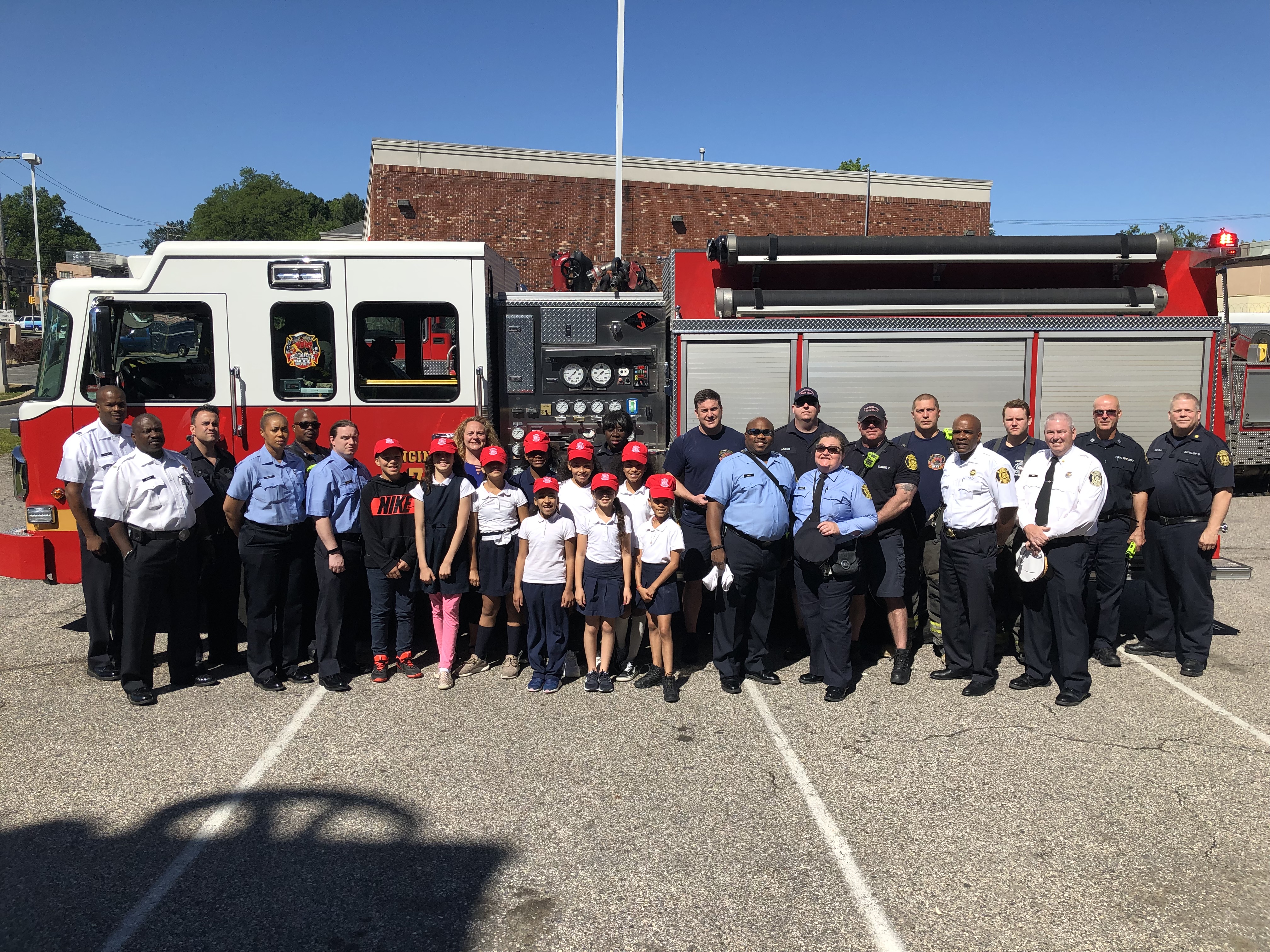 Jr. Fire Patrol with firemen and truck