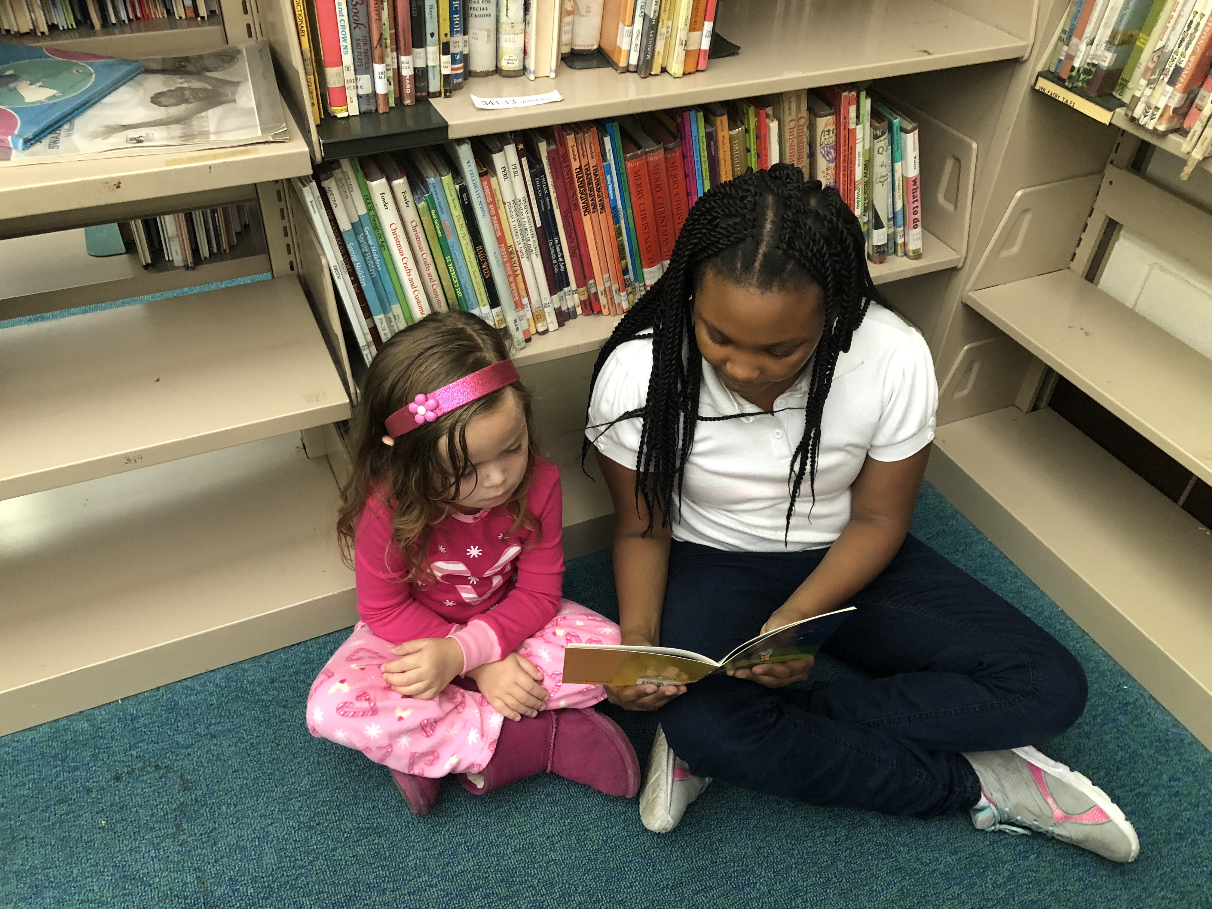 Students read together in the library