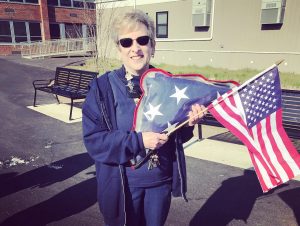 Mrs. Shelley with American Flags