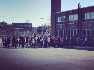 Students walking in honor of Sam