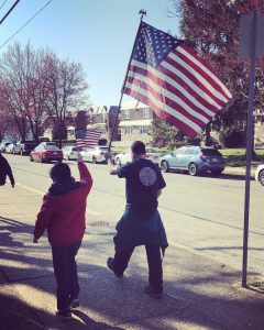 Teacher and student with American Flags