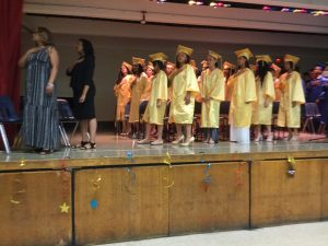 Students standing for Pledge of Allegiance