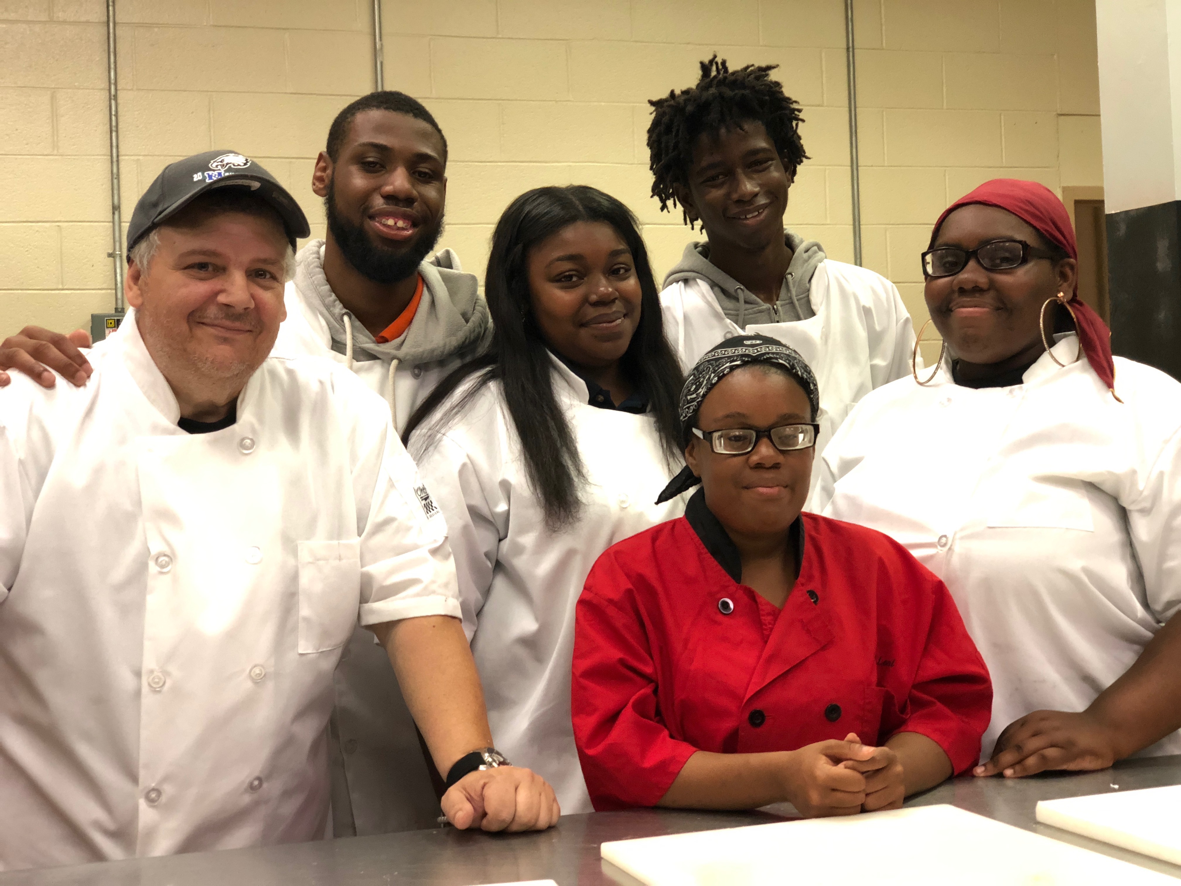 Chef Michael Bell with his culinary students. 