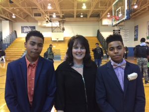 Mrs. Arnold and Sam and solomon Johnson, orgainzers of the academy March Madness games