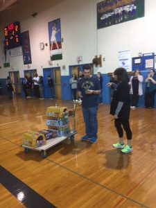 Mr. Dumsha running our concessions at the March Madness tournament 