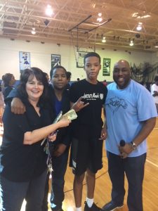 Half court shot winner with Mrs. Arnold and Mr. Vance