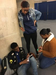 Students playing stock exchange game in New York