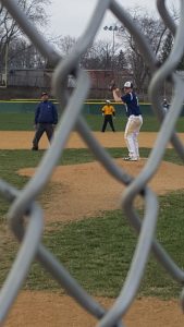 S. Aldinger pitching for Roxborough High school baseball