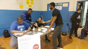 Student volunteers working blood drive at Academies @ Roxborough