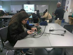 Students working on pulse oximeters int he CCP labs in the BMET program