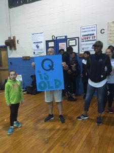 Academy March Madness Mr. Mckenna with Q is old sign