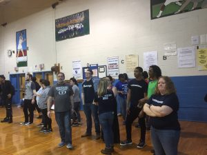 Academy March Madness teachers on the sidelines