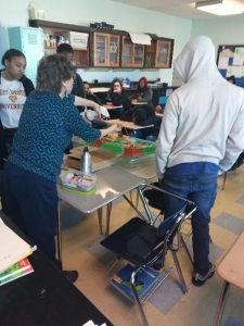 PWD visits classroom with water table demo