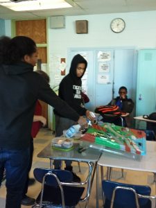 PWD visits classroom with water table demo