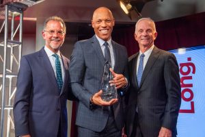 Dr. Hite holding his award at WHYY